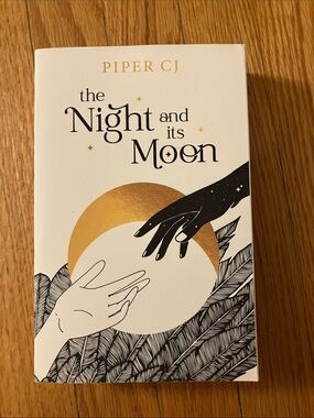 Piper CJ "The Night and Its Moon" Book - White & Gold Cover